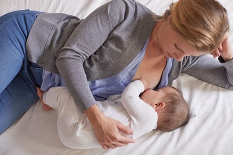 Learn How to Get a Baby to Latch While Breastfeeding