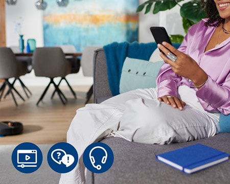 Frau, die den Philips Roboter mit der HomeRun App einrichtet