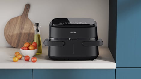 Der Philips Airfryer Flexible Basket 1000 Series kreiert eine extragroße Portion oder zwei Gerichte gleichzeitig