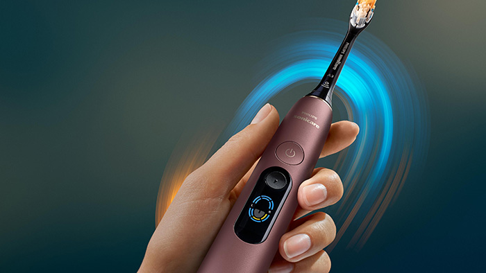 The on-device Mouth Map shows brushing coverage and missed areas